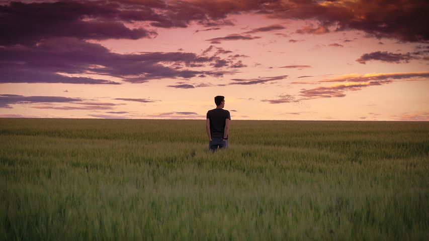 man in grass